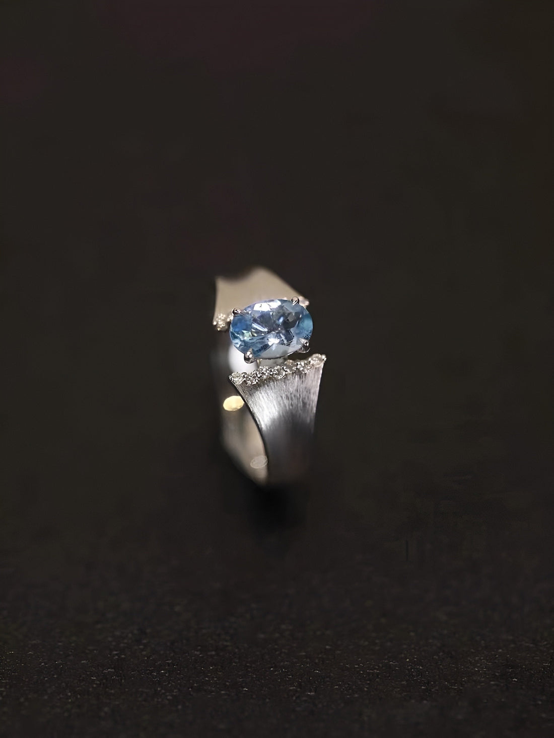 Blue Topaz Oval Cut Silver Ring