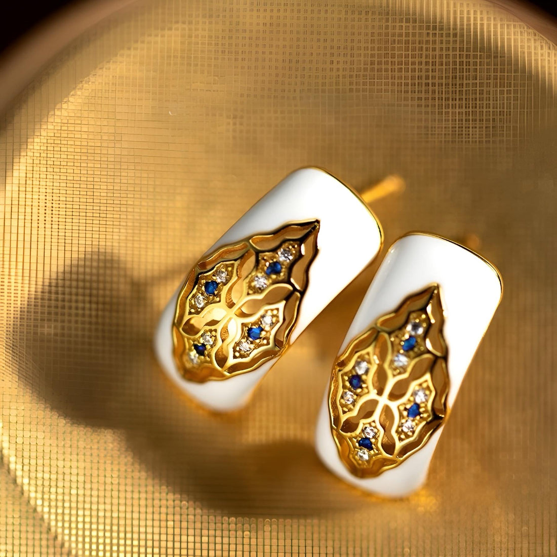 White Enamel Earrings with Blue Sapphires