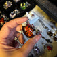 Hand-Carved Natural Baltic Amber Cameo Necklace with Rubies and White Sapphires