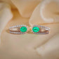 Elegant 18K Gold Emerald Hoops