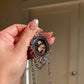 Hand-Carved Natural Baltic Amber Cameo Necklace with Rubies and White Sapphires