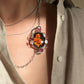 Hand-Carved Natural Baltic Amber Cameo Necklace with Rubies and White Sapphires