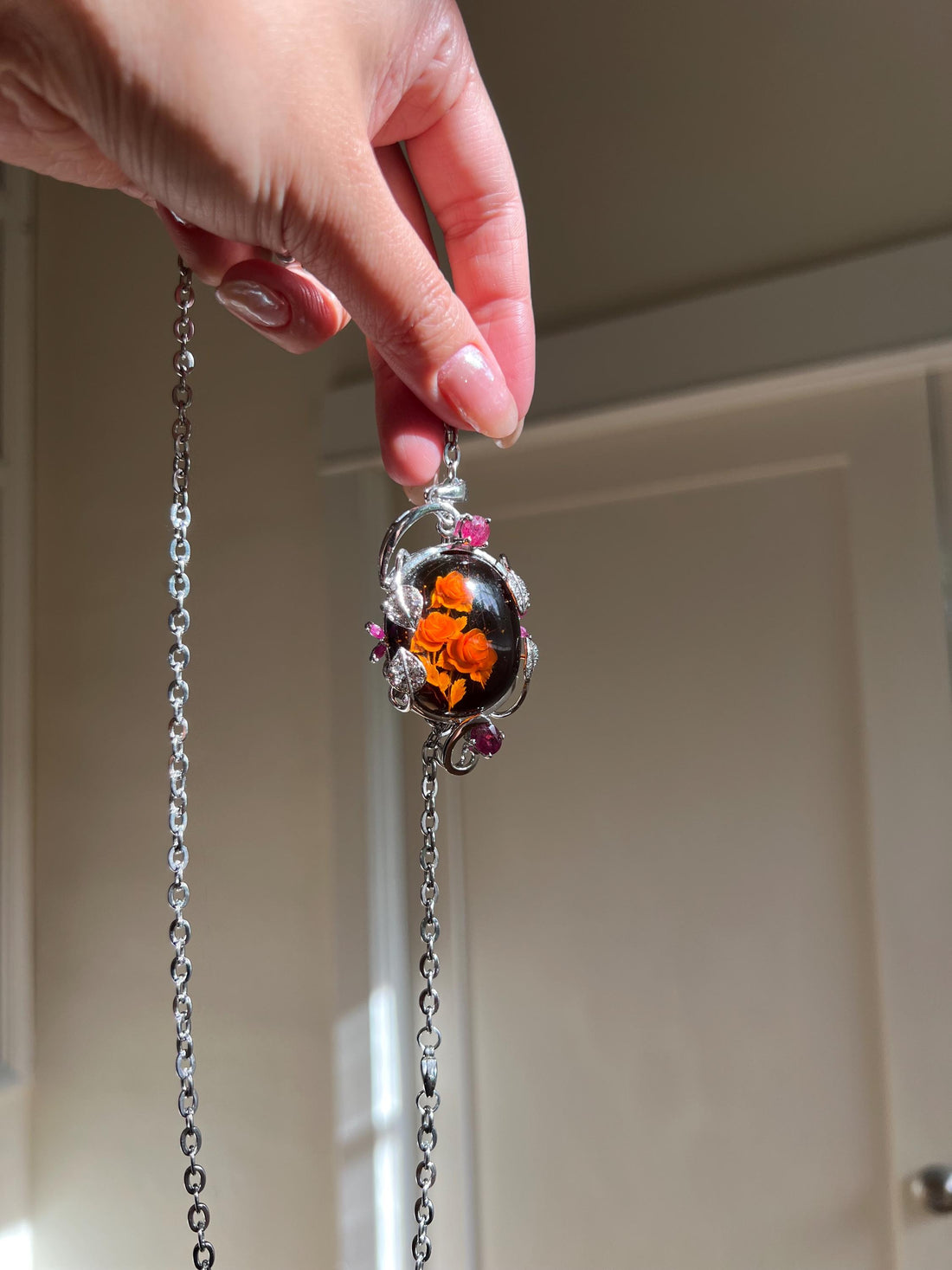 Hand-Carved Natural Baltic Amber Cameo Necklace with Rubies and White Sapphires