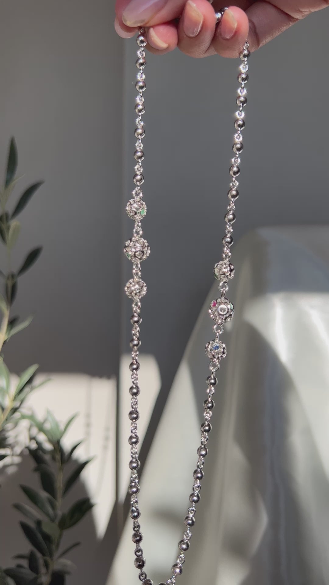 Retrograde Silver Jeweled Beads Necklace