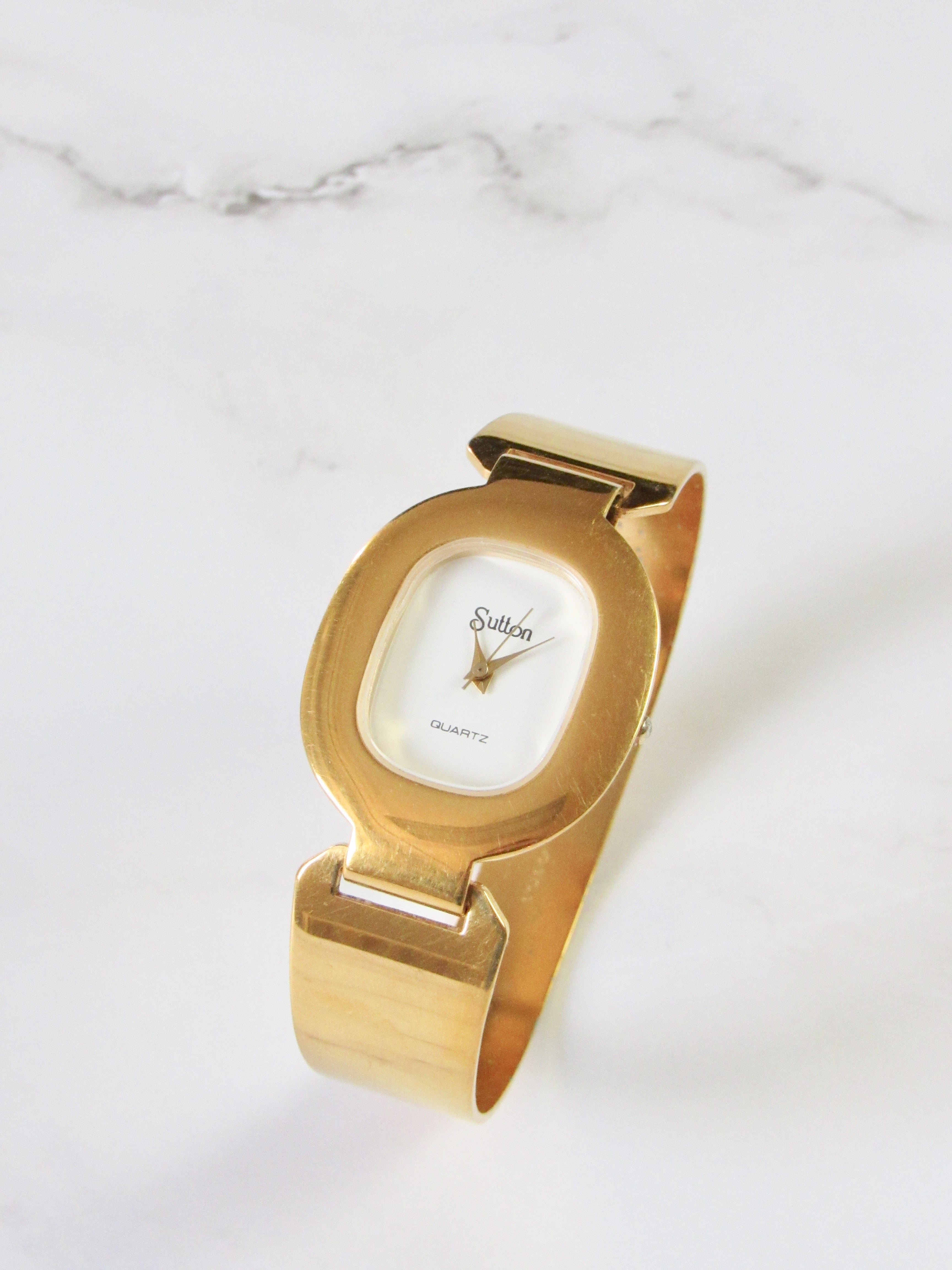 Sutton Oval Gold Bangle Watch