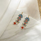 Pagoda Floral Blue Enamel Drop Earrings with Pearl in Gold
