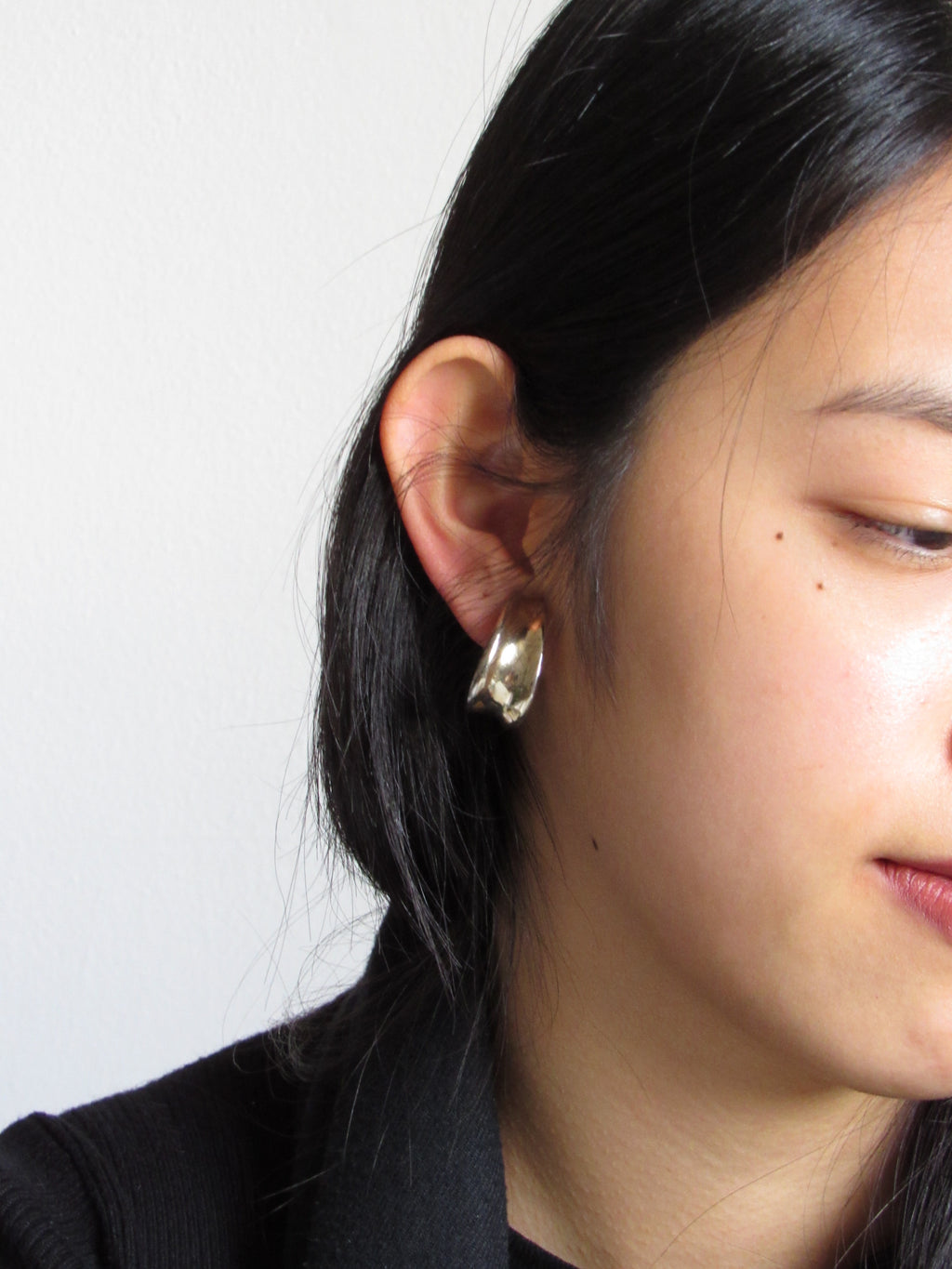 Curled Gold Tone Hoop Earrings