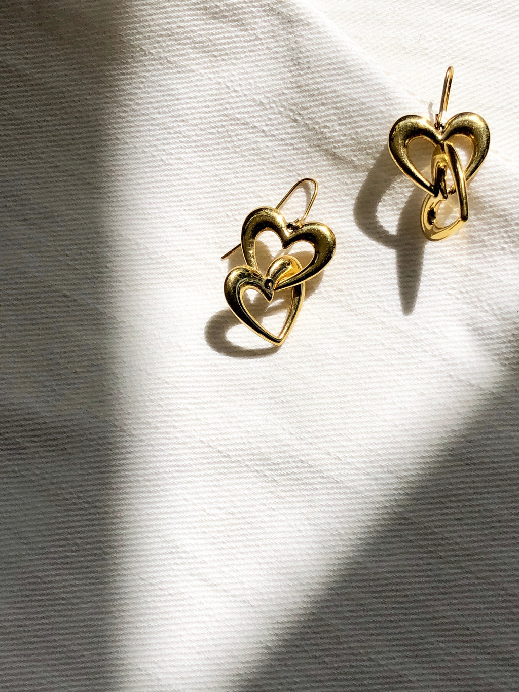 Interlocking Hearts Gold Dangle Earrings